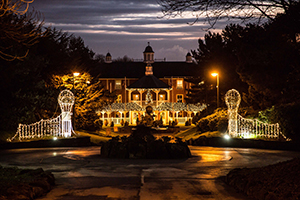 Image shows the approach to the Alton Towers Hotel, Staffordshire, all lit up for Christmas